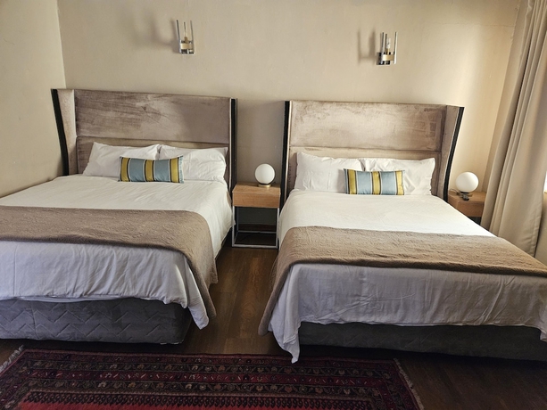 Imagen de la habitación del Hotel Four Seasons Lehae Guest House. Foto 9