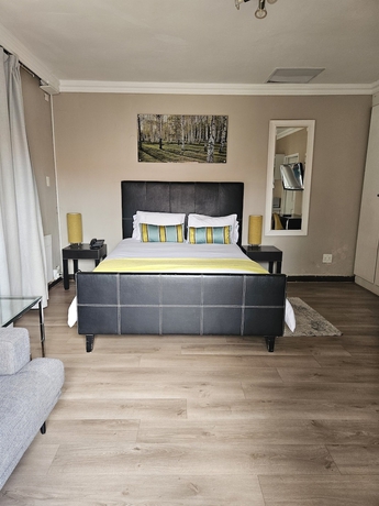 Imagen de la habitación del Hotel Four Seasons Lehae Guest House. Foto 10