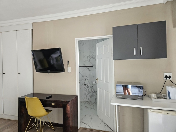 Imagen de la habitación del Hotel Four Seasons Lehae Guest House. Foto 12