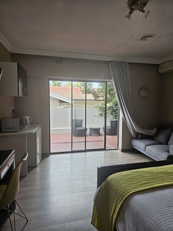 Imagen de la habitación del Hotel Four Seasons Lehae Guest House. Foto 13