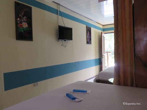 Imagen de la habitación del Hotel Four Seasons Seaview. Foto 5