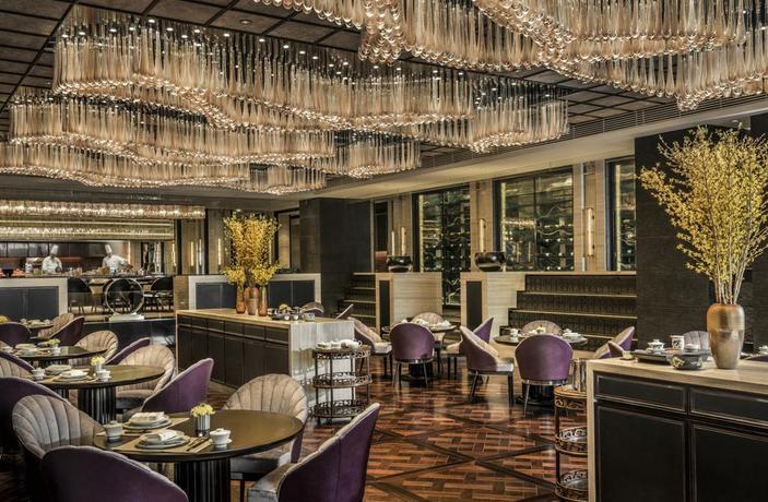 Imagen del bar/restaurante del Hotel Four Seasons Tianjin. Foto 3