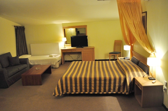 Imagen de la habitación del Hotel Four Seasons, Trilofo. Foto 6