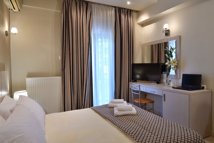 Imagen de la habitación del Hotel Four Seasons, Trilofo. Foto 9