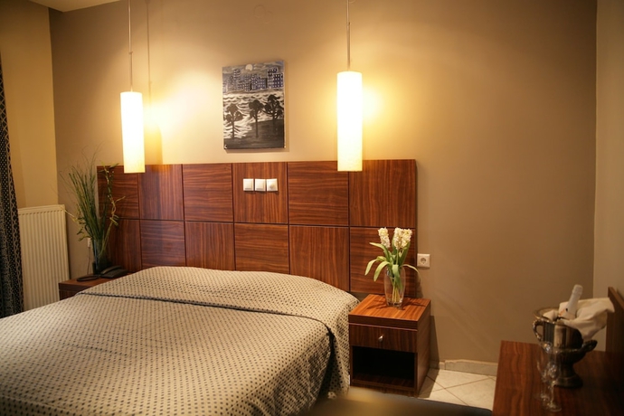 Imagen de la habitación del Hotel Four Seasons, Trilofo. Foto 10