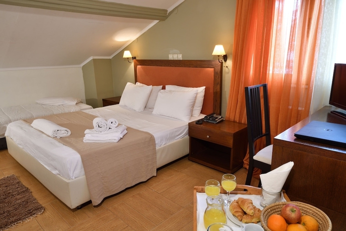 Imagen de la habitación del Hotel Four Seasons, Trilofo. Foto 11