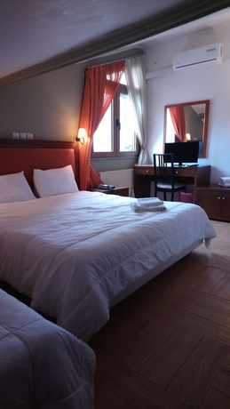 Imagen de la habitación del Hotel Four Seasons, Trilofo. Foto 12