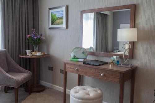 Imagen de la habitación del Hotel Four Seasons & Leisure Club. Foto 5