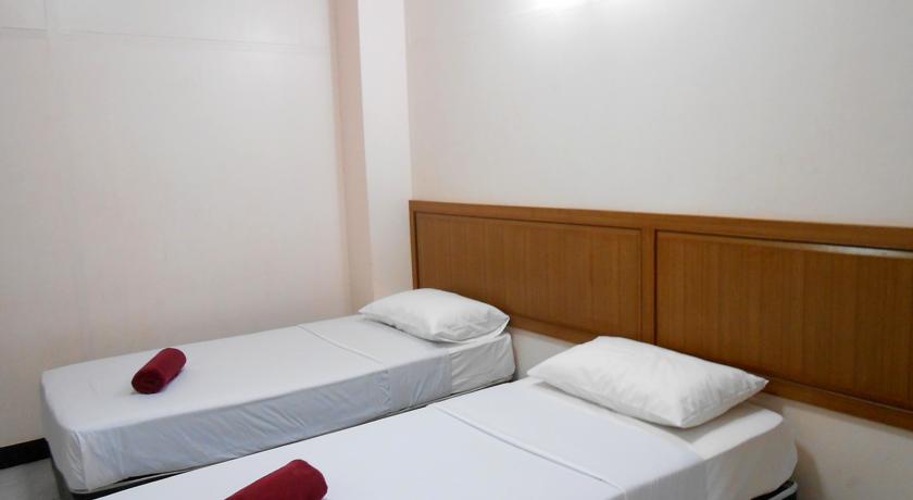 Imagen de la habitación del Hotel Four Sons Village. Foto 2