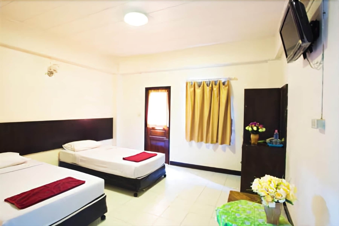Imagen de la habitación del Hotel Four Sons Village. Foto 16
