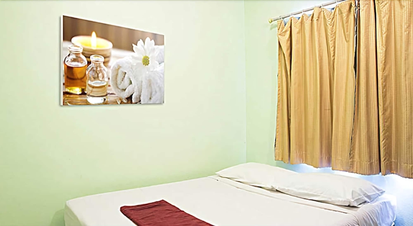 Imagen de la habitación del Hotel Four Sons Village. Foto 18