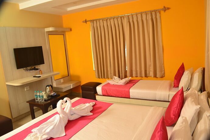 Imagen de la habitación del Hotel Four Square Holidayz. Foto 9