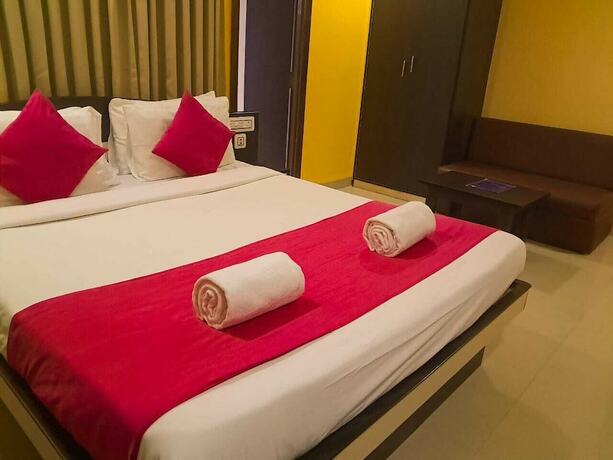 Imagen de la habitación del Hotel Four Square Holidayz. Foto 11