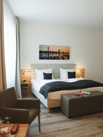 Imagen de la habitación del Hotel Four Stars by City. Foto 6