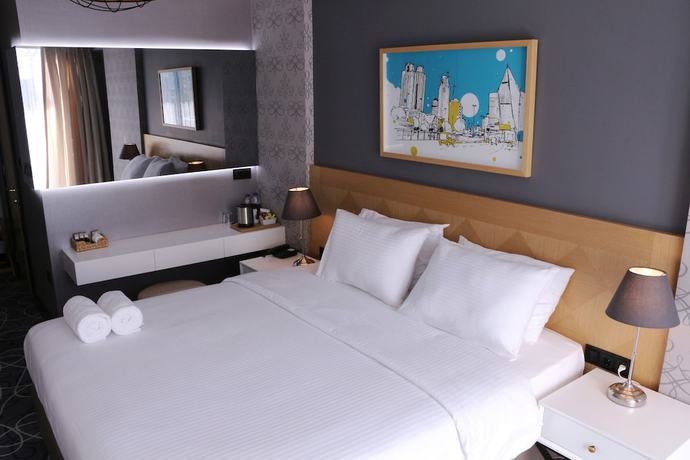Imagen de la habitación del Hotel Four-G. Foto 3