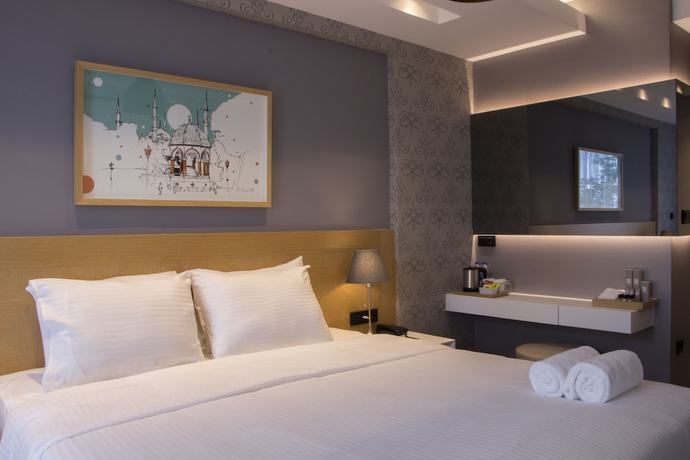 Imagen de la habitación del Hotel Four-G. Foto 19