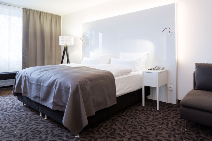 Imagen de la habitación del Hotel FourSide Plaza Hotel Trier, Trademark Collection by Wyndham. Foto 5