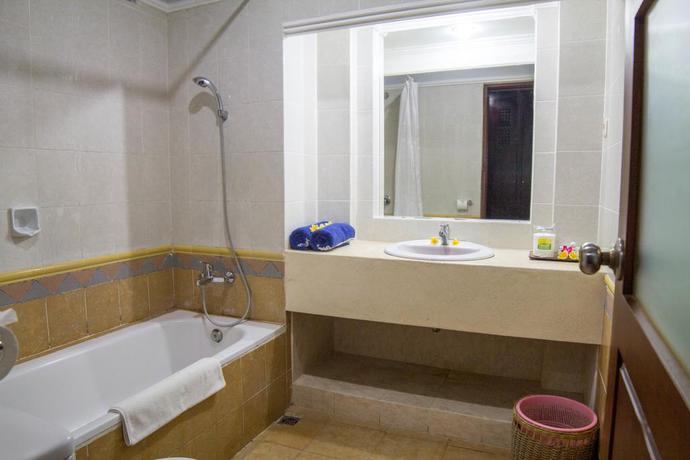 Imagen de la habitación del Hotel Fourteen Roses Beach. Foto 6