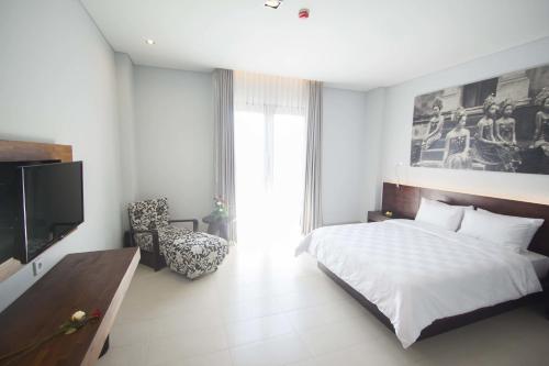 Imagen de la habitación del Hotel Fourteen Roses Boutique Legian - Chse Certified. Foto 7