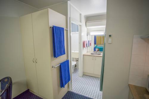 Imagen de la habitación del Hotel Fourth Ave Motor Inn. Foto 1