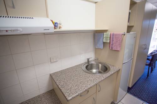 Imagen de la habitación del Hotel Fourth Ave Motor Inn. Foto 6