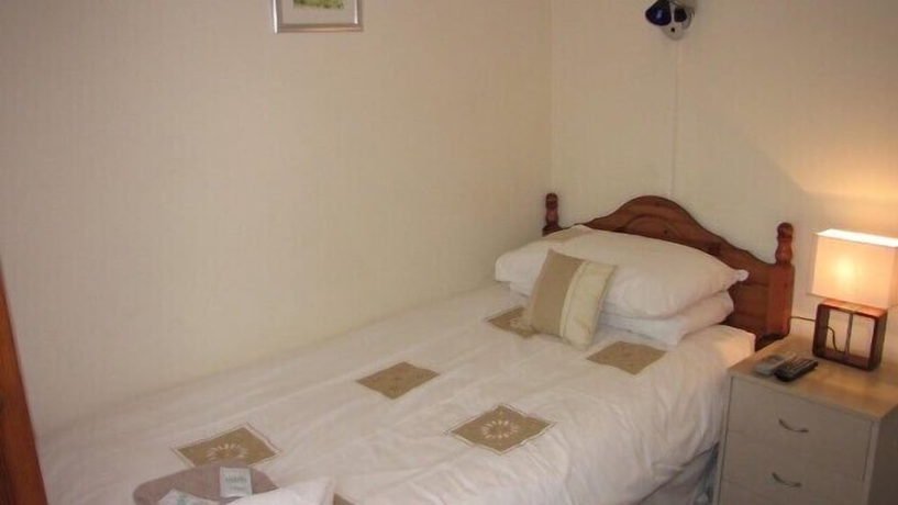 Imagen de la habitación del Hotel Fourways Guest House. Foto 4