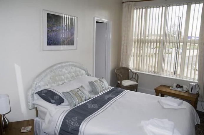 Imagen de la habitación del Hotel Fourways Guest House. Foto 8