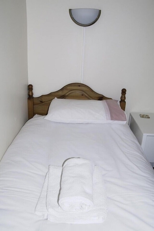 Imagen de la habitación del Hotel Fourways Guest House. Foto 9