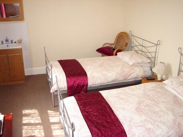 Imagen de la habitación del Hotel Fourways Guest House. Foto 10