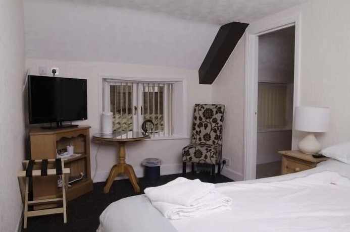 Imagen de la habitación del Hotel Fourways Guest House. Foto 11