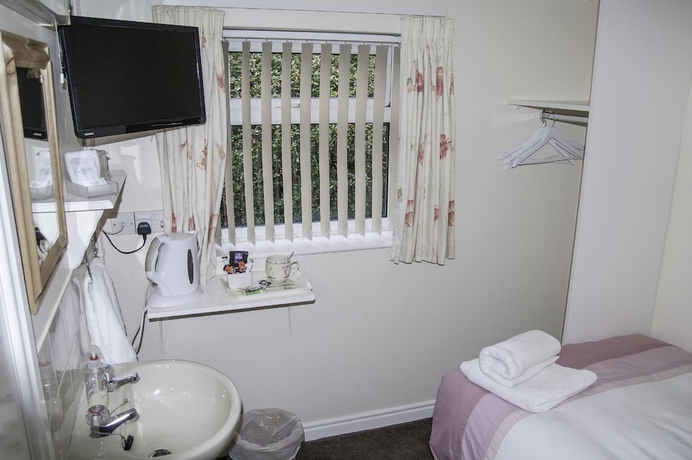 Imagen de la habitación del Hotel Fourways Guest House. Foto 15