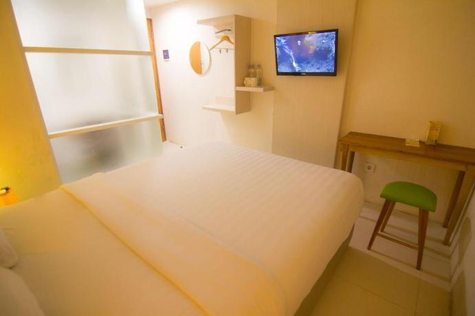 Imagen de la habitación del Hotel Fovere Puri Semarang. Foto 10