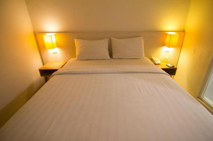 Imagen de la habitación del Hotel Fovere Puri Semarang. Foto 11