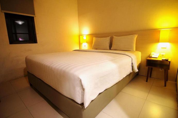 Imagen de la habitación del Hotel Fovere Puri Semarang. Foto 13
