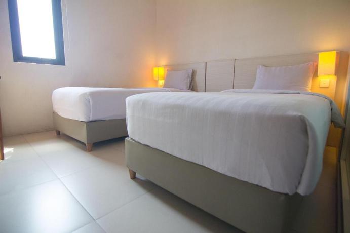 Imagen de la habitación del Hotel Fovere Puri Semarang. Foto 15