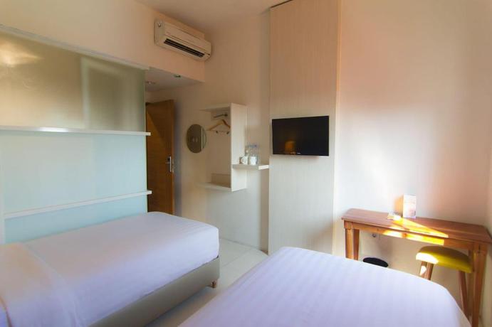 Imagen de la habitación del Hotel Fovere Puri Semarang. Foto 16