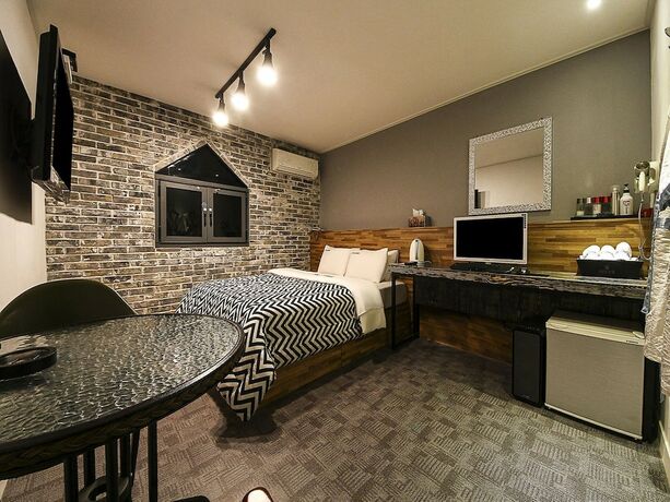 Imagen de la habitación del Hotel Fox Avenue Hotel. Foto 7