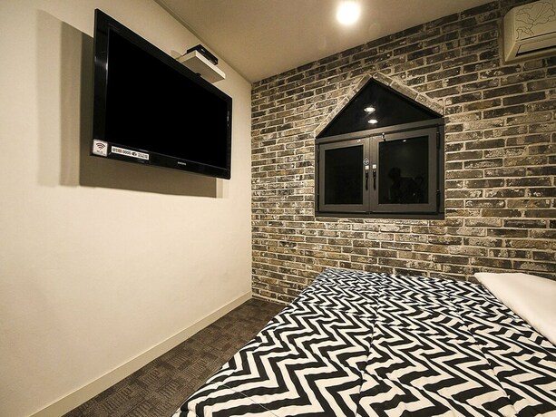 Imagen de la habitación del Hotel Fox Avenue Hotel. Foto 18