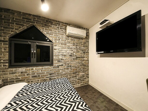 Imagen de la habitación del Hotel Fox Avenue Hotel. Foto 19