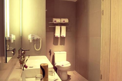 Imagen de la habitación del Hotel Fox Pekanbaru. Foto 8