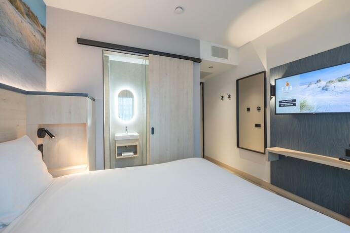 Imagen de la habitación del Hotel Fox The Hague Scheveningen. Foto 17