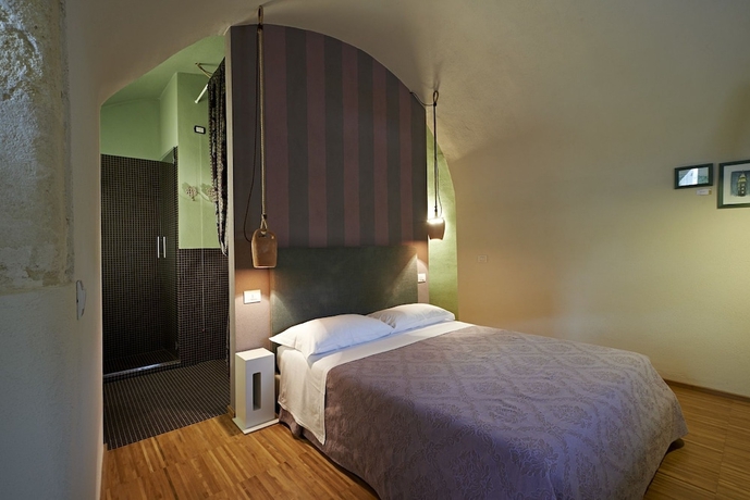 Imagen de la habitación del Hotel Fra I Sassi - Residence. Foto 14