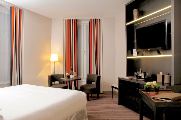Imagen de la habitación del Hotel France D'antin Opéra. Foto 2