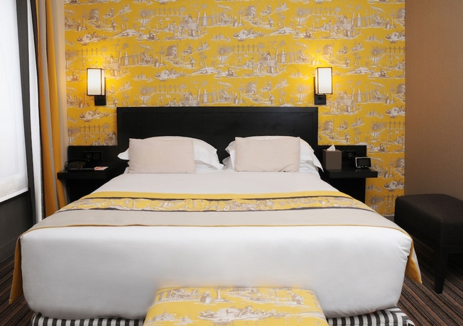 Imagen de la habitación del Hotel France D'antin Opéra. Foto 5