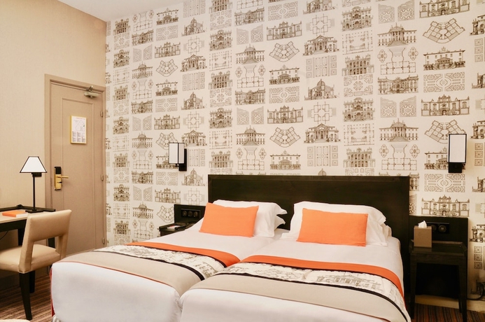 Imagen de la habitación del Hotel France D'antin Opéra. Foto 9