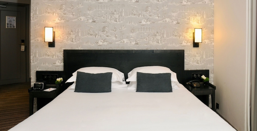 Imagen de la habitación del Hotel France D'antin Opéra. Foto 11