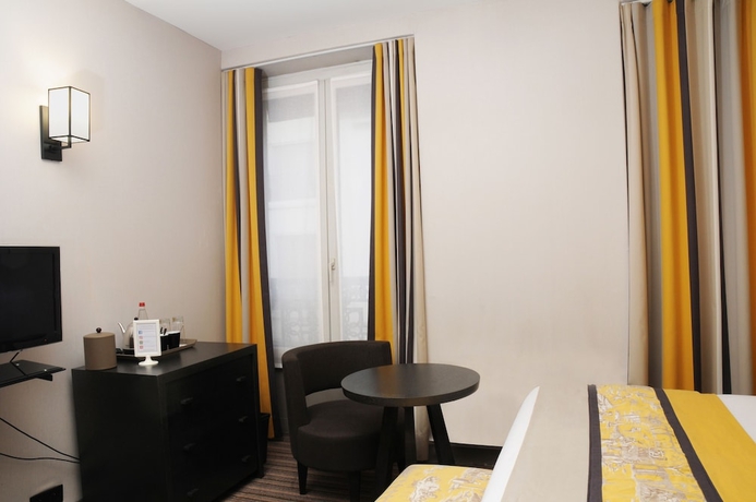 Imagen de la habitación del Hotel France D'antin Opéra. Foto 12