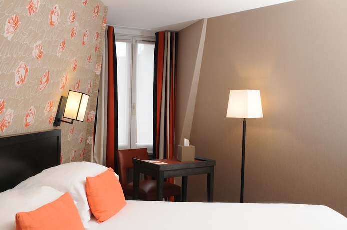 Imagen de la habitación del Hotel France D'antin Opéra. Foto 14