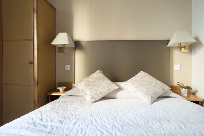 Imagen de la habitación del Hotel France Eiffel. Foto 5