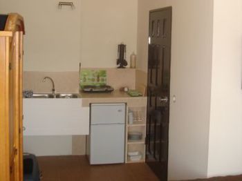 Imagen de la habitación del Hotel Frangipani Apartments. Foto 2